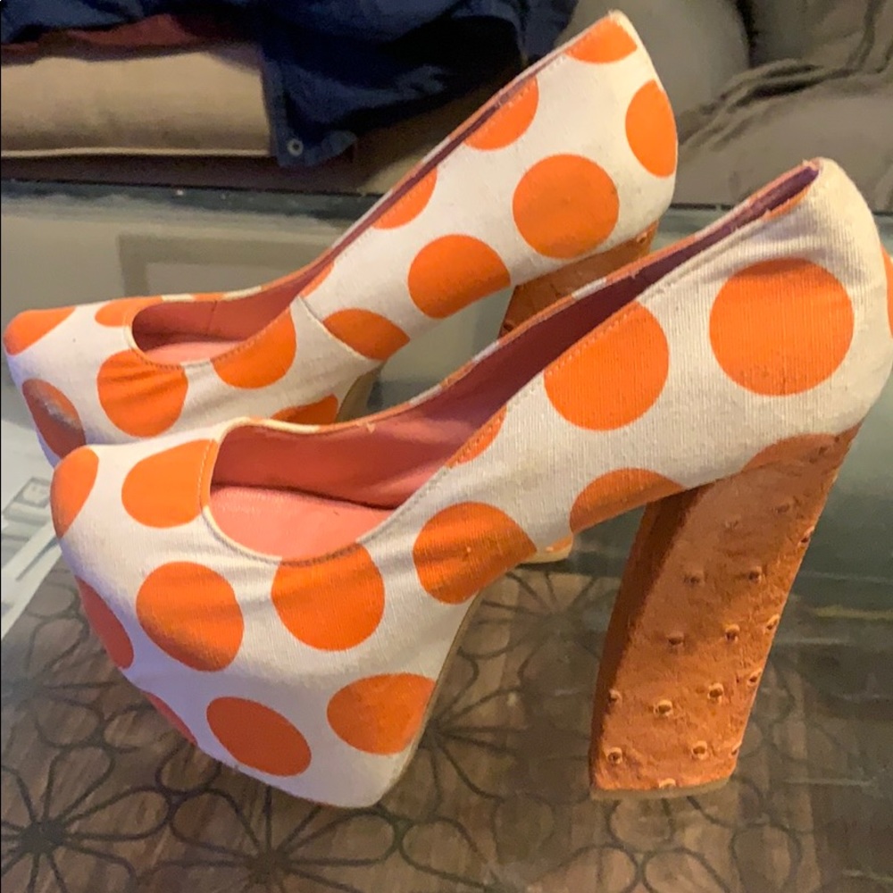 Used Orange dot stilletos